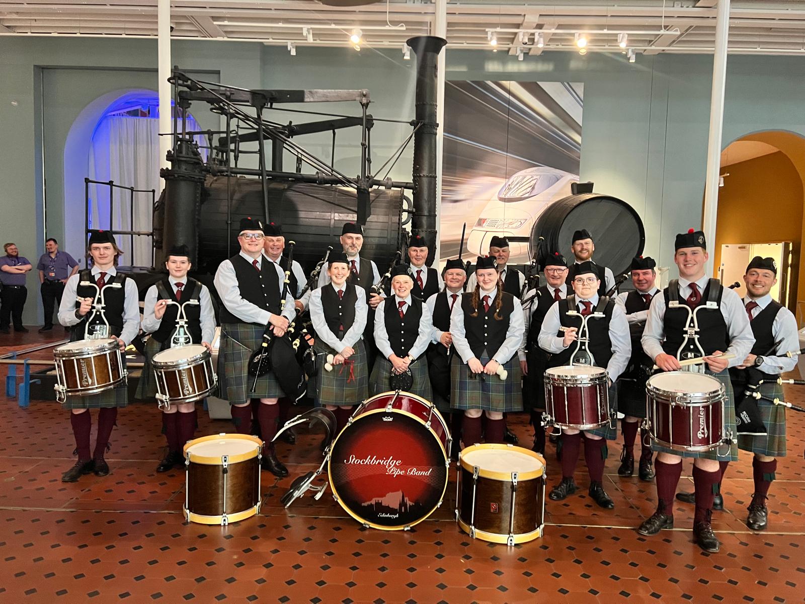 Stockbridge Pipe Band performing at a corporate engagement